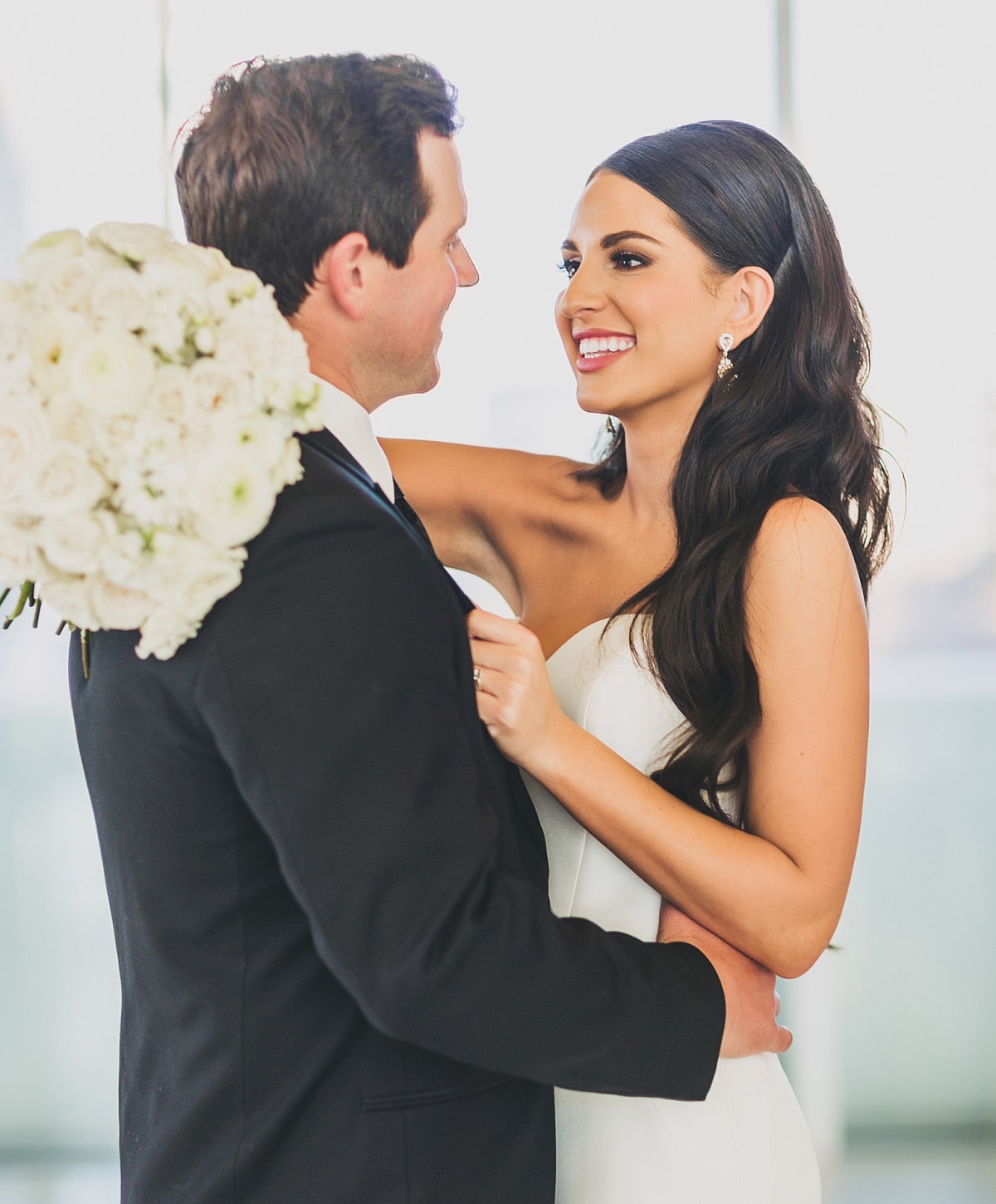 Bride and groom sharing a romantic moment.