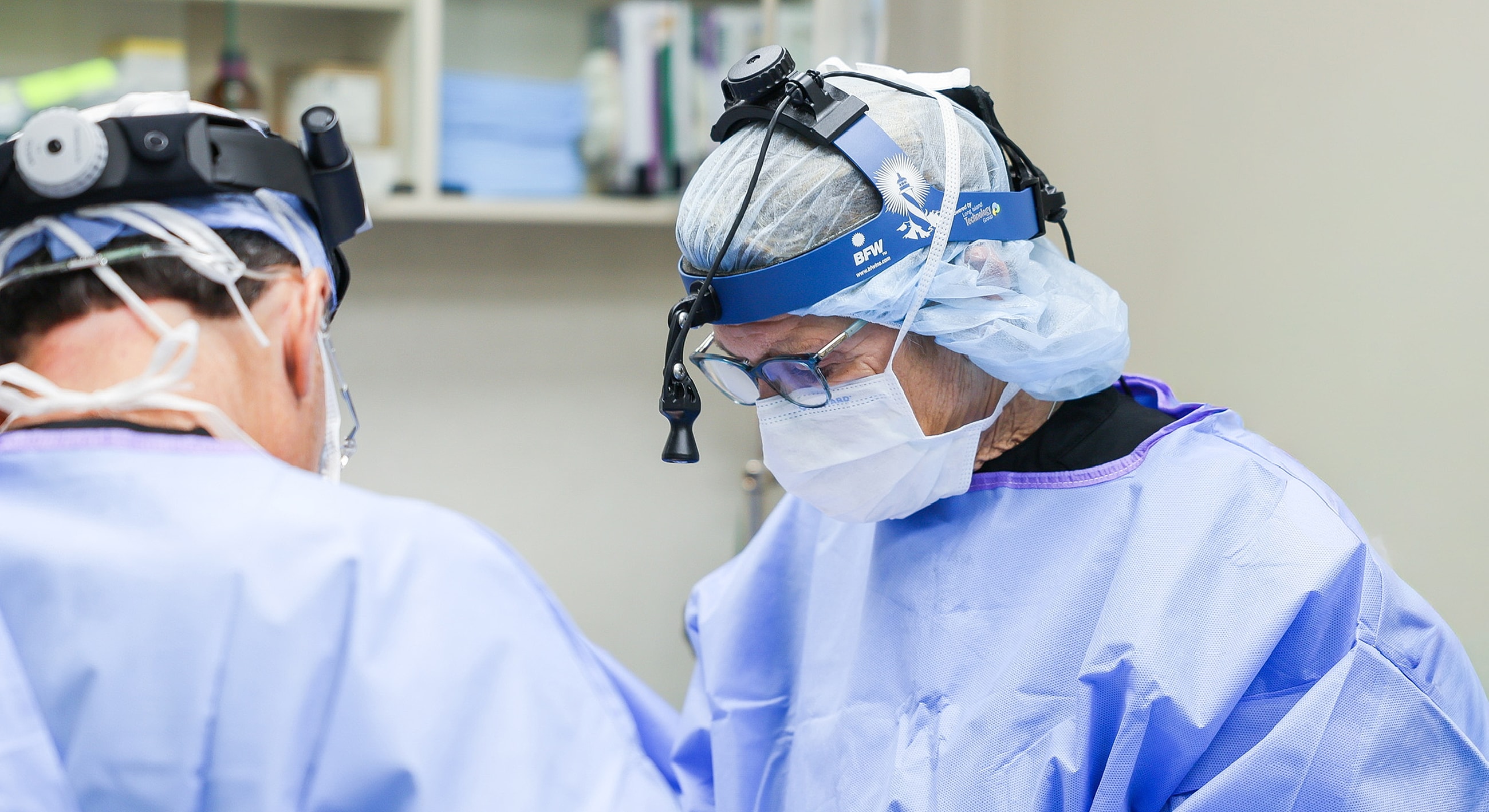 Surgeons focused during a medical procedure.