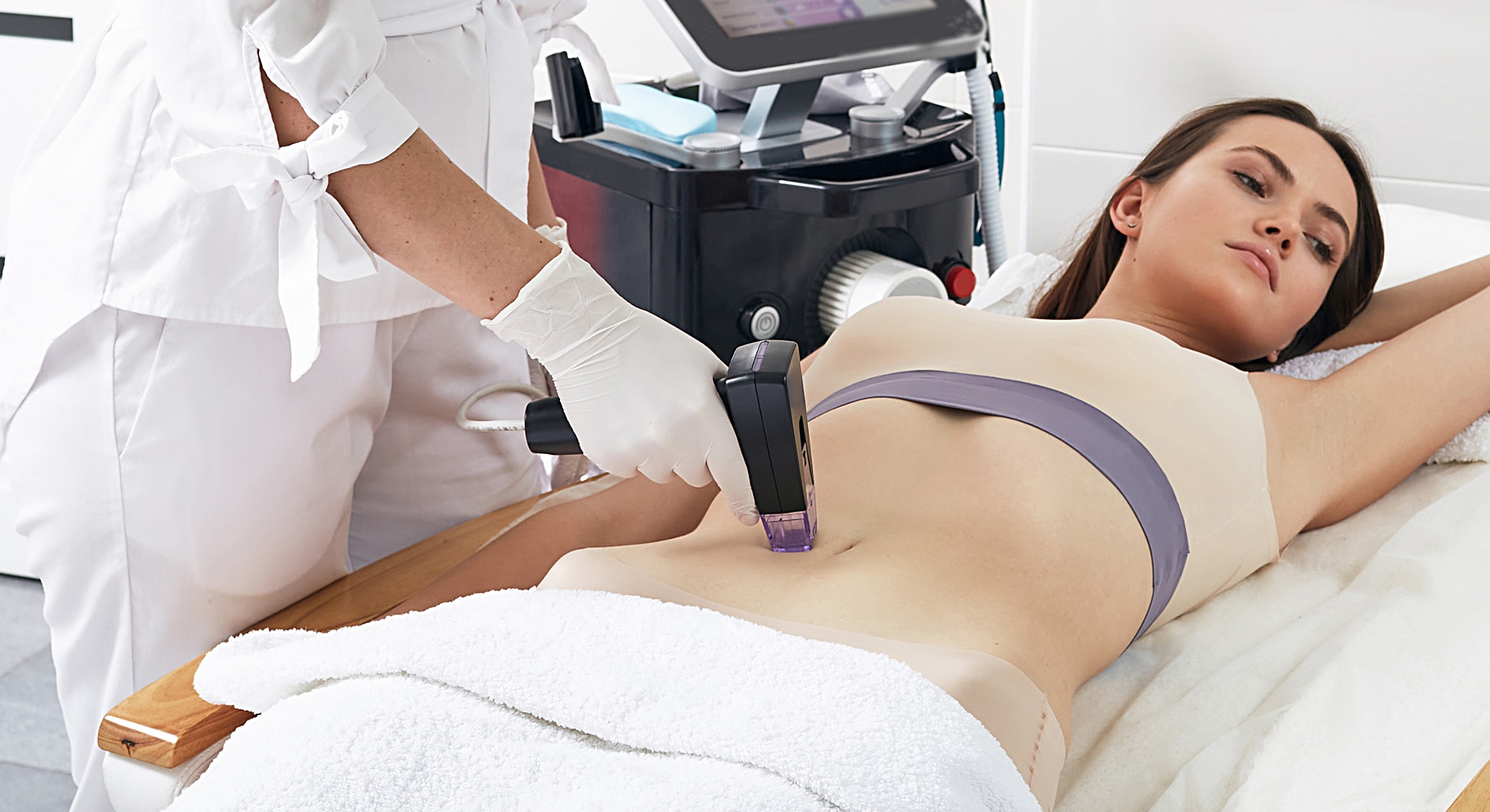 Woman receiving a cosmetic treatment in spa.